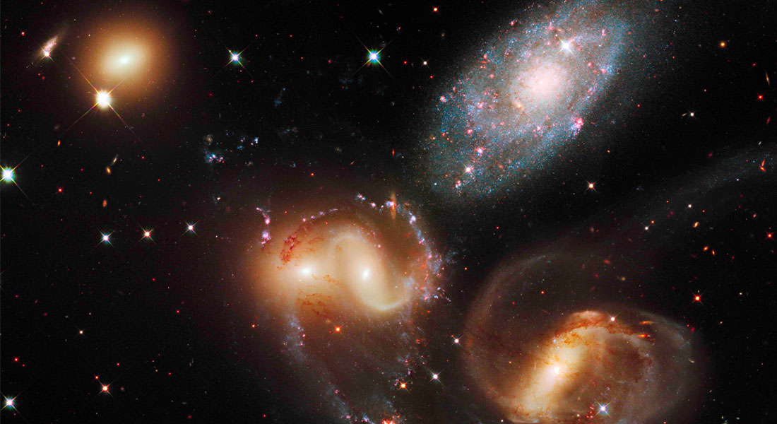 Using the Hubble Space Telescope, an international team of astronomers led by researchers at the Cosmic Dawn Center in Copenhagen, have investigated a galaxy seen almost 11 billion years back in time. Contrary to typical observations, the galaxy was discovered not by the light it emits, but by the light it absorbs. The galaxy itself evades observations, but has at least one nearby companion. Together, these galaxies comprise an early group which may later evolve to resemble the Local Group in which we live.