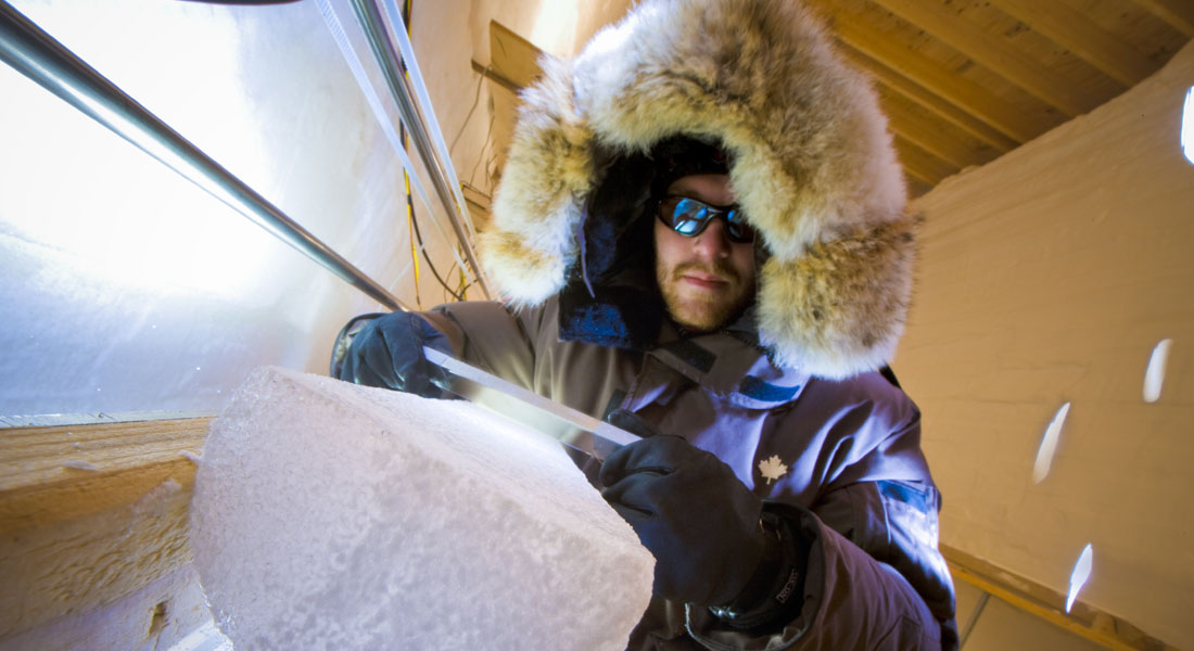 Associate professor Bo Vinther preparing an ice core for analysis (Photographer: Christian Morel)