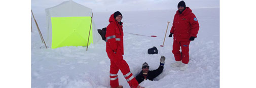 Jan and Andrea are happily helping Anders to dig himself into a hole that will later be covered by the green tent in the background. Jan and Andrea are happily helping Anders to dig himself into a hole that will later be covered by the green tent in the background.