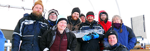 The RECAP team (minus Emily from the firn gas team, who was fast asleep) celebrating ice core “bag 500”, corresponding to a depth of 275 meters. From left: Dennis (driller, drill mechanic, and polar bear special consultant), Bruce (driller, generator caretaker, and much more), Lizzie (doctor and logger), Bo (project leader and logger), Todd (firn gas project leader), Trevor (chief driller and general bad-ass), Johannes (shallow driller, snow pit digger, and logger), Sune (field leader and logger), and Sarah (cook). 