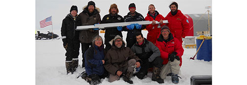 The current RECAP team proudly presenting the bedrock ice core that reaches down to 584.11m depth. Left to right: Lizzie, Bo, Steff, Trevor, Jan, Andrea, Sarah, Anders, Niccoló, and Jakob. 